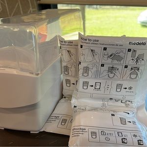 First Years Milk Storage Container and Medela Milk Storage Bags